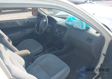 1999 Honda Civic Dx from USA, damaged, VIN 1HGEJ6227XL010037